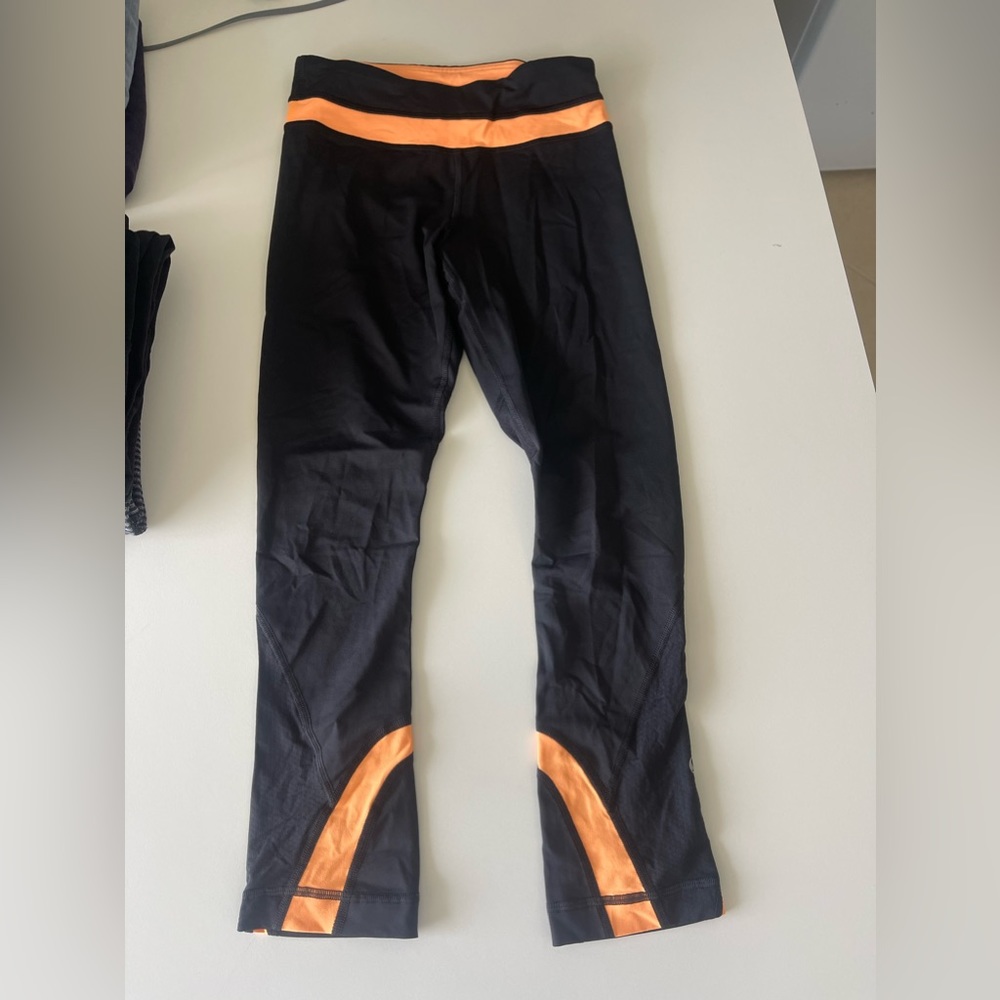 Black and orange Lululemon leggings